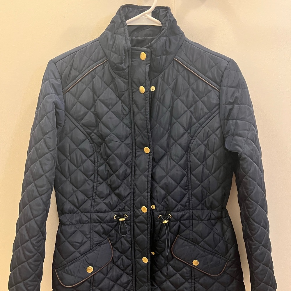 Navy blue puffer with gold details